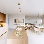 Встроенная открытая кухня с современной мебелью.