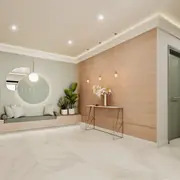 Ухоженные общие зоны с полом из керамогранита и простой мебелью.